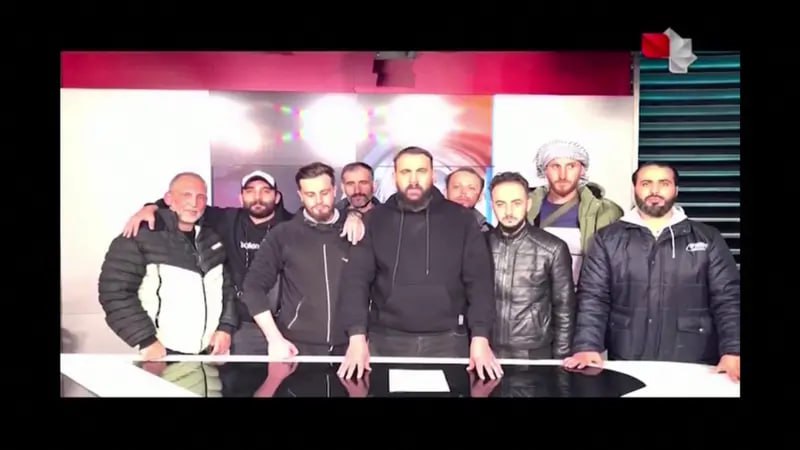 Фото Al Jazeera. Повстанцы захватили телецентр и вышли в прямой эфир, сообщив, что режим Башара Асада свергнут
